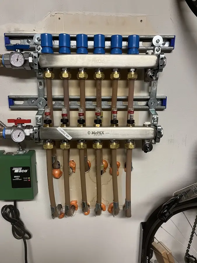 Plumber performing Water Heater Repair at a residential property in Wisconsin Dells